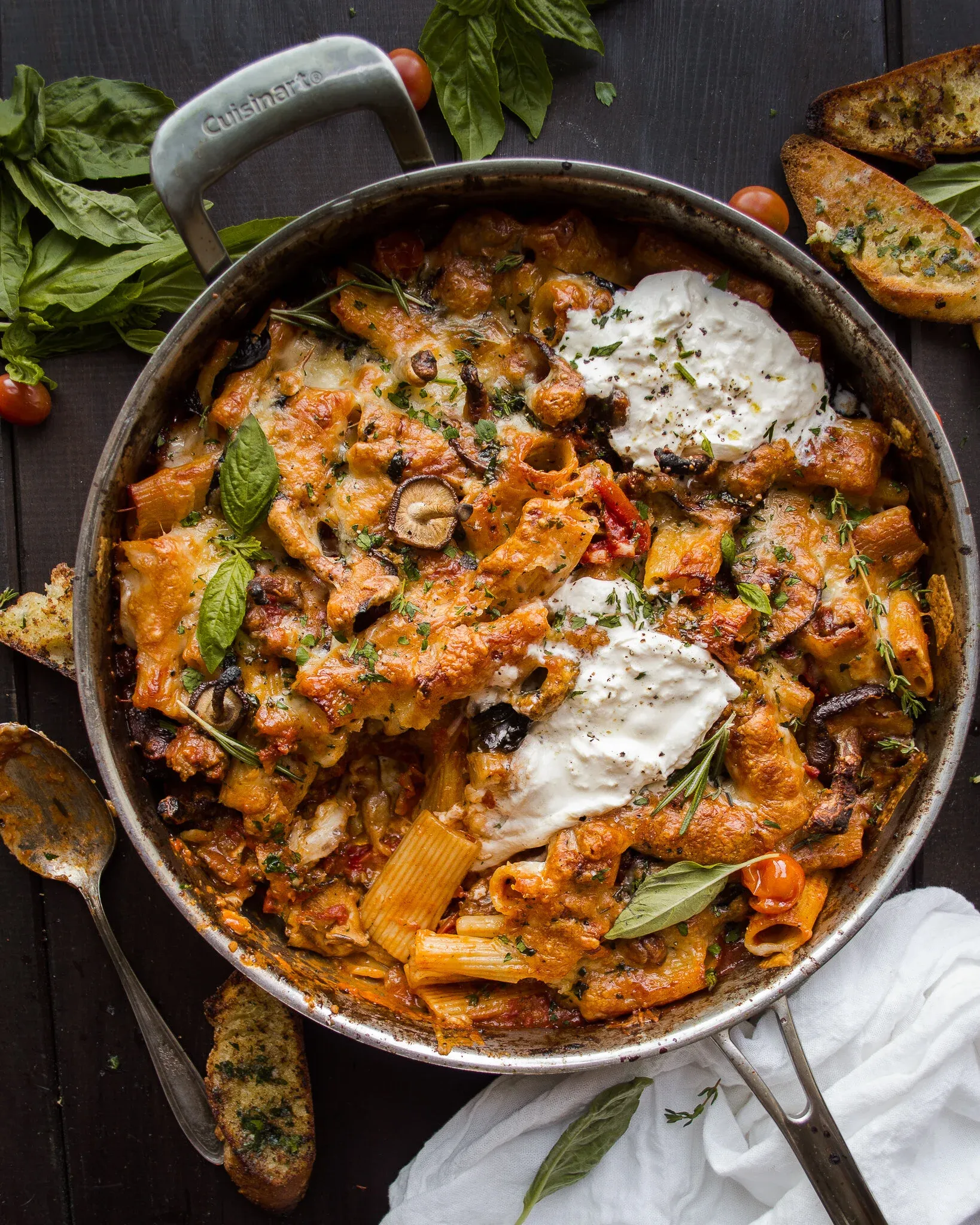 Overhead view of the Cheesy One-Pot Roasted Red Pepper and Tomato Pasta at a slightly lower angle in the same Cuisinart skillet