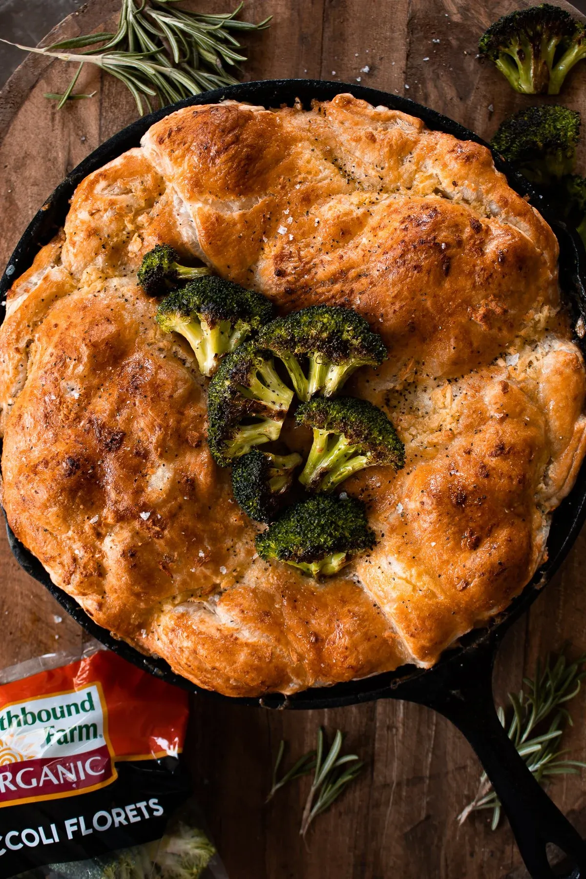 Overhead close-up of the Roasted Broccoli and Chicken Pot Pie in its cast iron skillet before serving