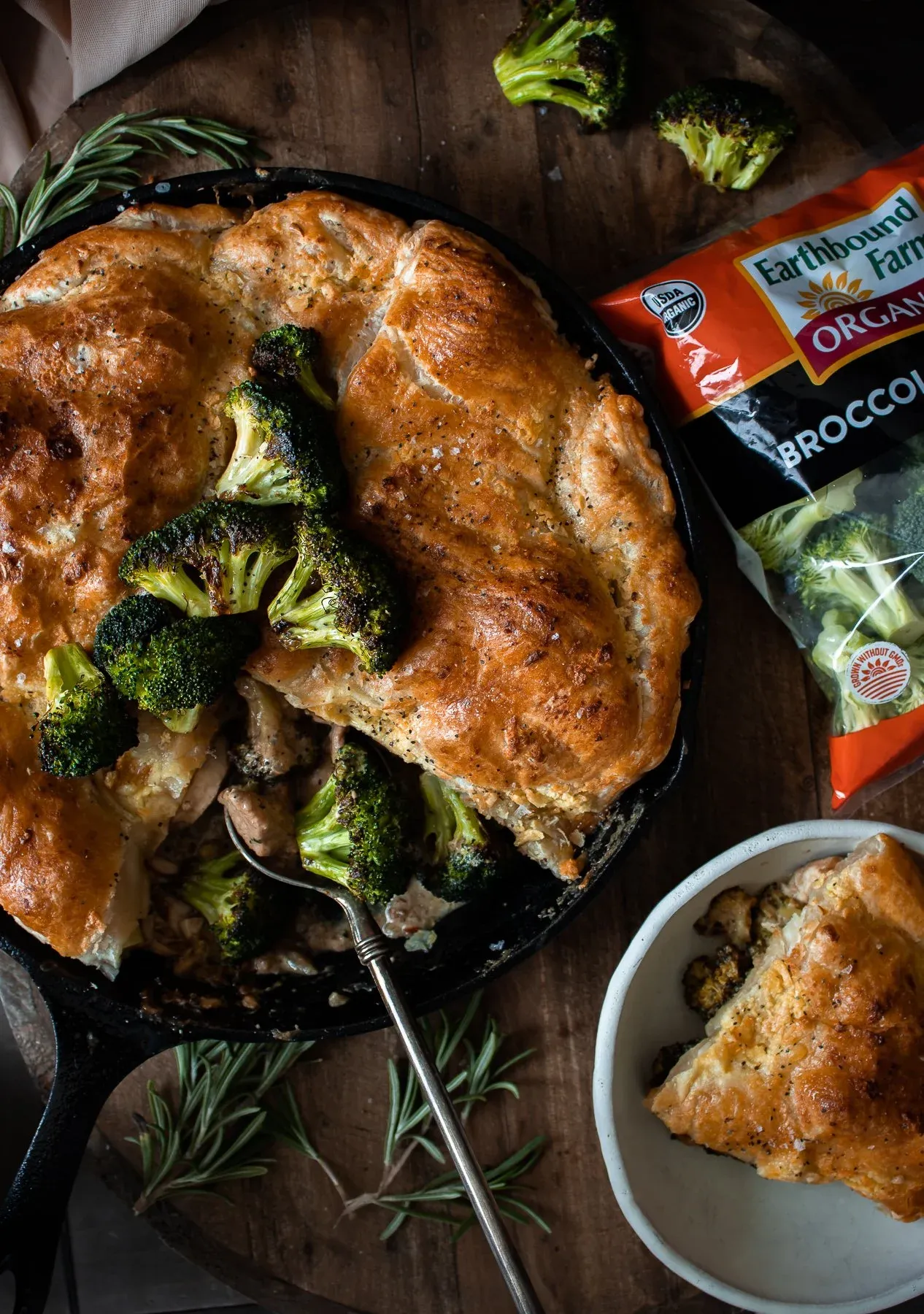 Overhead shot of Roasted Broccoli and Chicken Pot Pie with Garlic Butter Crust in a black cast iron skillet
